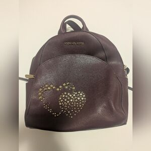 Michael Kors Burgundy Backpack with Gold Heart Details